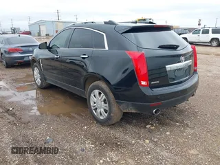 2011 Cadillac SRX Luxury Collection z VIN 3GYFNAEY7BS622584, wystawiony jako IAAI lot #42450036 z przebiegiem 140 250 mil mil oraz . Historia ofert i sprzedaży dostępna na DreamBid. Obrazek 3.