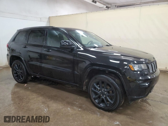 2021 Jeep Grand Cherokee Laredo X with VIN 1C4RJFAG0MC535661, listed as a Copart auction lot 57431135 with 101,314 mi miles and Salvage title. Bid and sale history available at DreamBid. Image 4.