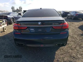 2018 BMW 7 Series M760i xDrive with VIN WBA7H6C50JG614781, listed as a Copart auction lot 83689234 with 49,873 mi miles and Salvage Title. Bid and sale history available at carsss.com. Image 6.