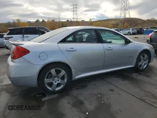 2009 Pontiac G6 with VIN 1G2ZL577094232011, listed as a Copart auction lot 77175054 with 133,353 mi miles and Salvage title. Bid and sale history available at DreamBid. Image 3.