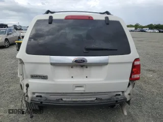 2010 Ford Escape Limited with VIN 1FMCU0E74AKC89196, listed as a Copart auction lot 50990585 with 144,830 mi miles and Salvage title. Bid and sale history available at DreamBid. Image 6.