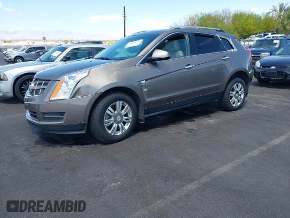 2012 Cadillac SRX Luxury Collection with VIN 3GYFNAE30CS612453, listed as a IAAI auction lot 42048235 with 173,982 mi miles and . Bid and sale history available at carsss.com. Image 2.