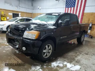 2012 Nissan Titan S with VIN 1N6AA0EC2CN302012, listed as a Copart auction lot 50864625 with 200,219 mi miles and Clean title. Bid and sale history available at DreamBid. Image 1.