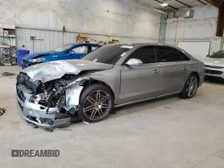 2011 Audi A8 с VIN WAURVAFD7BN027479, выставлен на аукционе Copart как лот 63823315 с пробегом 139 840 миль миль и На запчасти • Non repairable. История ставок и продаж доступна на DreamBid. Изображение 1.