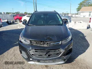 2020 Chevrolet Trax LT with VIN KL7CJLSB4LB011695, listed as a IAAI auction lot 41854666 with 49,884 mi miles. Bid and sale history available at carsss.com. Image 12.