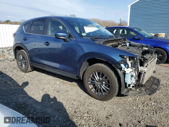 2017 Mazda CX-5 Touring with VIN JM3KFBCL4H0208376, listed as a Copart auction lot 48529895 with 71,689 mi miles and Salvage Title. Bid and sale history available at carsss.com. Image 4.
