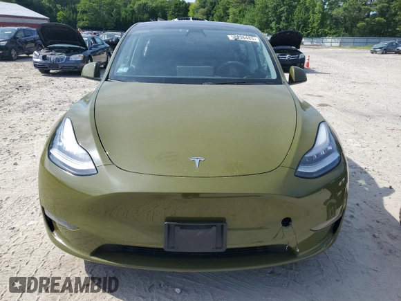 2021 Tesla Model Y Long Range z VIN 5YJYGDEE4MF085975, wystawiony jako Copart lot #58838485 z przebiegiem 72 550 mil mil oraz Szkoda całkowita • Salvage title. Historia ofert i sprzedaży dostępna na DreamBid. Obrazek 5.