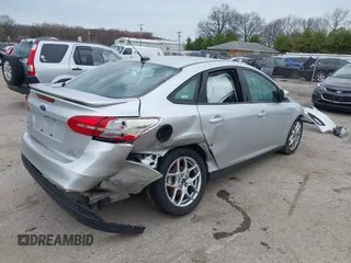 2015 Ford Focus SE with VIN 1FADP3F24FL347206, listed as a IAAI auction lot 41941987 with 96,473 mi miles and . Bid and sale history available at DreamBid. Image 6.