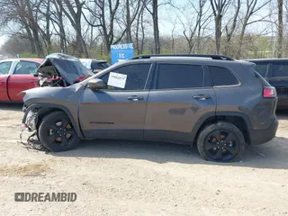 2021 Jeep Cherokee Altitude with VIN 1C4PJLLB8MD115101, listed as a IAAI auction lot 39082879 with 58,266 mi miles. Bid and sale history available at carsss.com. Image 13.