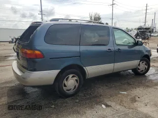 2000 Toyota Sienna LE with VIN 4T3ZF13C1YU267463, listed as a Copart auction lot 71667624 with 0 mi miles and Salvage Title. Bid and sale history available at carsss.com. Image 3.
