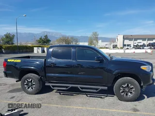 2018 Toyota Tacoma SR with VIN 3TMCZ5AN2JM127244, listed as a IAAI auction lot 41698199 with 61,535 mi miles and . Bid and sale history available at DreamBid. Image 13.