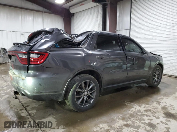 2018 Dodge Durango GT с VIN 1C4RDJDG4JC474798, выставлен на аукционе Copart как лот 56108425 с пробегом 104 319 миль миль и Списание • Salvage title. История ставок и продаж доступна на DreamBid. Изображение 3.