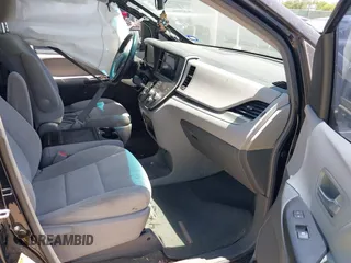 2015 Toyota Sienna LE AAS with VIN 5TDKK3DC7FS687525, listed as a IAAI auction lot 42250458 with 140,429 mi miles and . Bid and sale history available at DreamBid. Image 5.