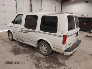 1998 Chevrolet Astro Cargo Van YF7 Upfitter with VIN 1GBDM19W1WB121821, listed as a IAAI auction lot 41463704 with 141,724 mi miles. Bid and sale history available at carsss.com. Image 3.