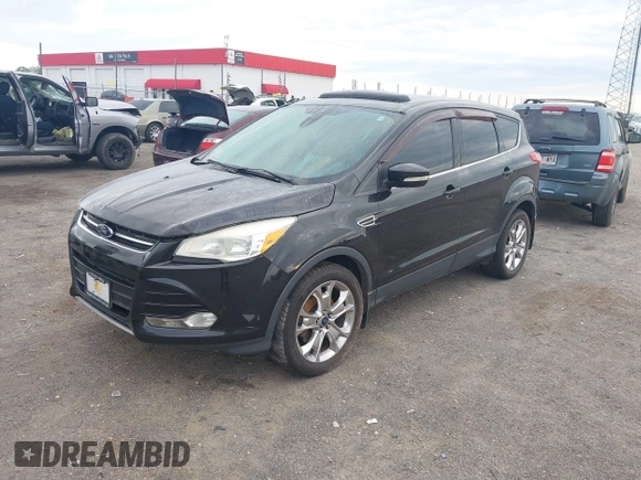 2013 Ford Escape SEL with VIN 1FMCU0HX5DUD64279, listed as a IAAI auction lot 42105721 with 178,271 mi miles. Bid and sale history available at carsss.com. Image 2.