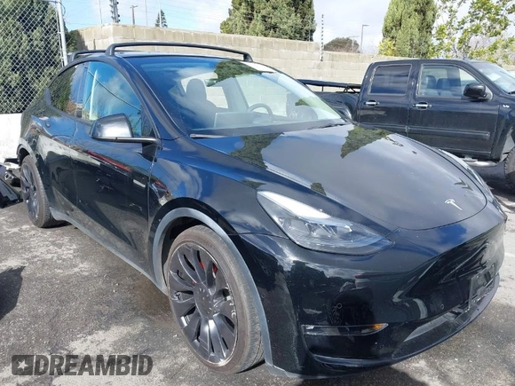 2022 Tesla Model Y Performance z VIN 7SAYGDEF9NF532880, wystawiony jako IAAI lot #41583671 z przebiegiem 38 057 mil mil oraz . Historia ofert i sprzedaży dostępna na DreamBid. Obrazek 1.