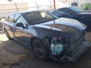 2019 Toyota Avalon Hybrid Limited with VIN 4T1B21FB4KU005887, listed as a IAAI auction lot 42014462 with 141,213 mi miles. Bid and sale history available at carsss.com. Image 1.