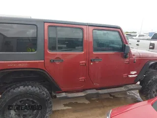 2007 Jeep Wrangler Unlimited Sahara with VIN 1J4GB59197L142223, listed as a IAAI auction lot 42025639 with 155,274 mi miles and . Bid and sale history available at DreamBid. Image 13.