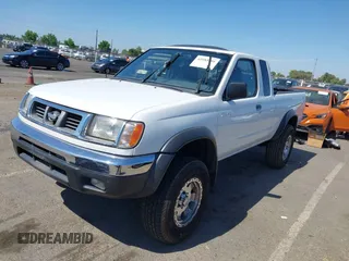 1999 Nissan Frontier XE with VIN 1N6ED26Y1XC321943, listed as a IAAI auction lot 42583401 with 65,803 mi miles and . Bid and sale history available at DreamBid. Image 2.