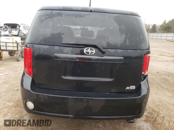 2009 Scion xB with VIN JTLKE50E491063990, listed as a Copart auction lot 53448265 with 152,420 mi miles and Salvage Title. Bid and sale history available at DreamBid. Image 6.