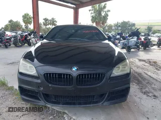 2014 BMW 6 Series 650i z VIN WBA6B2C57ED129681, wystawiony jako IAAI lot #42517803 z przebiegiem 208 644 mil mil oraz . Historia ofert i sprzedaży dostępna na DreamBid. Obrazek 13.