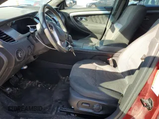2016 Ford Taurus SEL with VIN 1FAHP2E81GG145161, listed as a Copart auction lot 83750764 with 176,677 mi miles and Salvage Title. Bid and sale history available at DreamBid. Image 7.