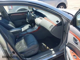 2005 Toyota Avalon XL with VIN 4T1BK36B95U047763, listed as a IAAI auction lot 41996438 with 224,315 mi miles. Bid and sale history available at carsss.com. Image 5.