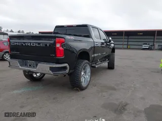 2019 Chevrolet Silverado 1500 LTZ with VIN 3GCUYGED9KG160780, listed as a IAAI auction lot 41574991 with 118,450 mi miles. Bid and sale history available at carsss.com. Image 4.