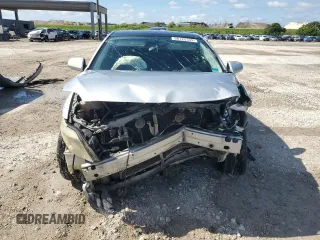 2005 Scion tC with VIN JTKDE177650059937, listed as a Copart auction lot 56122335 with 181,256 mi miles and Salvage Title. Bid and sale history available at DreamBid. Image 5.