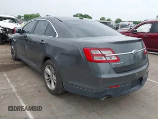 2015 Ford Taurus SEL z VIN 1FAHP2E81FG163058, wystawiony jako IAAI lot #42279778 z przebiegiem 127 957 mil mil oraz . Historia ofert i sprzedaży dostępna na DreamBid. Obrazek 3.