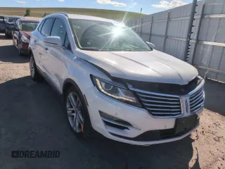 2015 Lincoln MKC z VIN 5LMTJ2AH7FUJ26375, wystawiony jako Copart lot #57830425 z przebiegiem 96 169 mil mil oraz Szkoda całkowita • Salvage title. Historia ofert i sprzedaży dostępna na DreamBid. Obrazek 14.