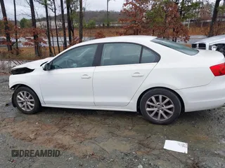 2013 Volkswagen Jetta SE with VIN 3VWDX7AJ2DM384537, listed as a IAAI auction lot 41548219 with 86,172 mi miles and . Bid and sale history available at DreamBid. Image 14.