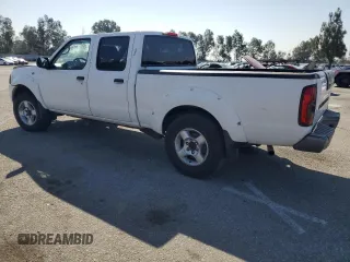 2004 Nissan Frontier XE with VIN 1N6ED29X94C423389, listed as a Copart auction lot 57357255 with 195,700 mi miles and Salvage title. Bid and sale history available at DreamBid. Image 2.