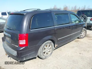 2010 Chrysler Town & Country Touring with VIN 2A4RR5DX5AR360173, listed as a IAAI auction lot 42082140 with 133,366 mi miles. Bid and sale history available at carsss.com. Image 4.