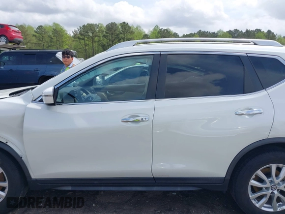 2018 Nissan Rogue SV with VIN KNMAT2MT8JP597774, listed as a IAAI auction lot 41956655 with 63,237 mi miles and . Bid and sale history available at carsss.com. Image 14.