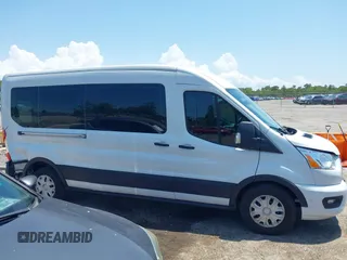 2020 Ford Transit Passenger XL z VIN 1FBAX2C80LKA23515, wystawiony jako IAAI lot #42176965 z przebiegiem 219 360 mil mil oraz . Historia ofert i sprzedaży dostępna na DreamBid. Obrazek 13.