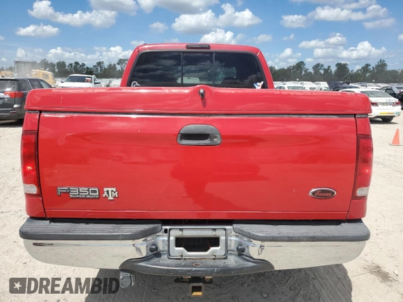 2000 Ford F-350 XL with VIN 3FTSW30F8YMA37190, listed as a Copart auction lot 67695694 with 555,401 mi miles and Salvage title. Bid and sale history available at DreamBid. Image 6.