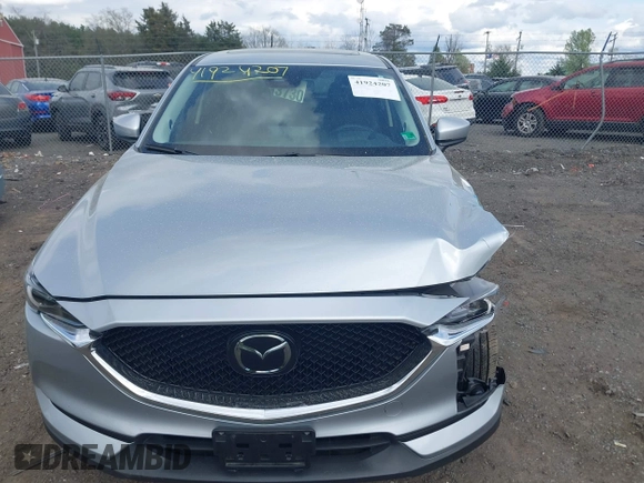 2021 Mazda CX-5 Grand Touring with VIN JM3KFBDM3M0354348, listed as a IAAI auction lot 41924207 with 45,786 mi miles. Bid and sale history available at carsss.com. Image 12.