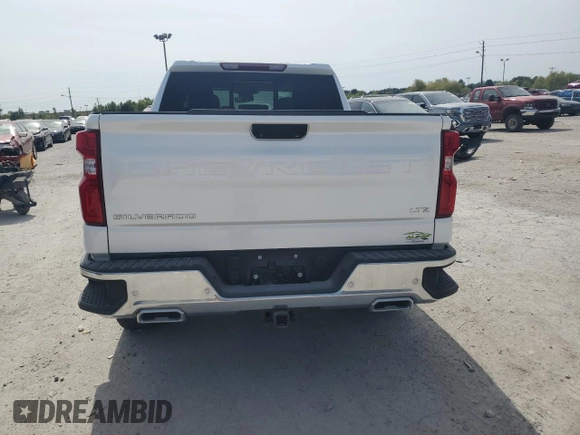 2023 Chevrolet Silverado 1500 LTZ with VIN 1GCUDGE88PZ205293, listed as a Copart auction lot 71095144 with 27,289 mi miles and Salvage Title. Bid and sale history available at carsss.com. Image 6.