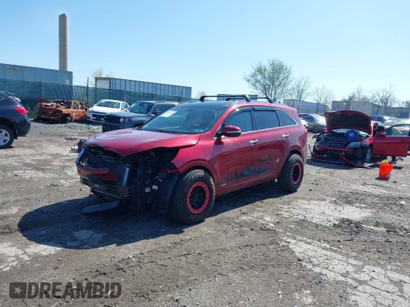 2016 Kia Sorento SX z VIN 5XYPKDA55GG113859, wystawiony jako IAAI lot #41937491 z przebiegiem 91 999 mil mil oraz . Historia ofert i sprzedaży dostępna na DreamBid. Obrazek 2.
