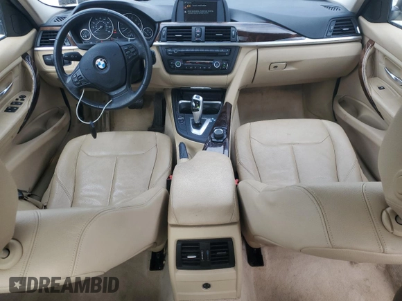 2013 BMW 3 Series 320i xDrive with VIN WBA3C3C57DF980971, listed as a Copart auction lot 57441155 with 131,263 mi miles and Salvage title. Bid and sale history available at DreamBid. Image 8.