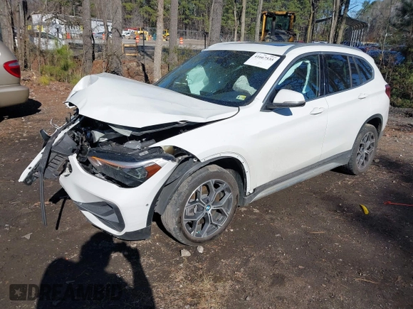 2022 BMW X1 xDrive28i z VIN WBXJG9C04N5V16794, wystawiony jako IAAI lot #41667535 z przebiegiem 55 747 mil mil oraz . Historia ofert i sprzedaży dostępna na DreamBid. Obrazek 17.