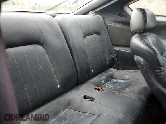 2003 Hyundai Tiburon GT z VIN KMHHN65F13U013420, wystawiony jako Copart lot #51234495 z przebiegiem 230 612 mil mil oraz Szkoda całkowita • Salvage title. Historia ofert i sprzedaży dostępna na DreamBid. Obrazek 10.