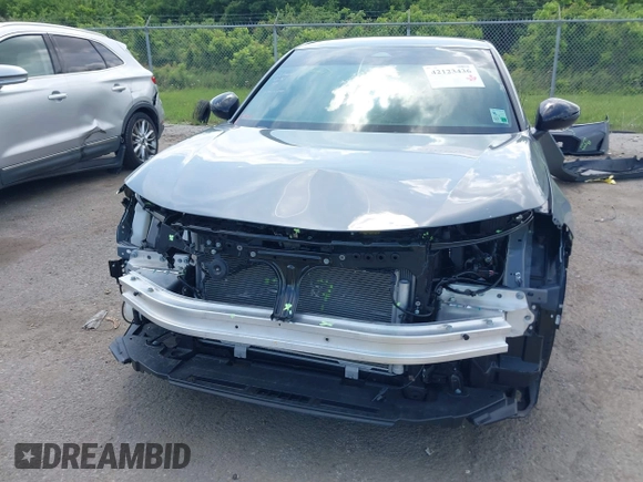 2025 Honda Civic Sport with VIN 2HGFE2F54SH564003, listed as a IAAI auction lot 42123436 with 7,042 mi miles and . Bid and sale history available at DreamBid. Image 13.