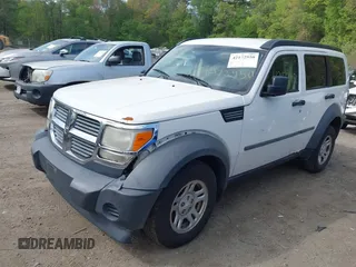 2007 Dodge Nitro SXT z VIN 1D8GU28K87W652037, wystawiony jako IAAI lot #42172950 z przebiegiem 172 487 mil mil oraz . Historia ofert i sprzedaży dostępna na DreamBid. Obrazek 2.