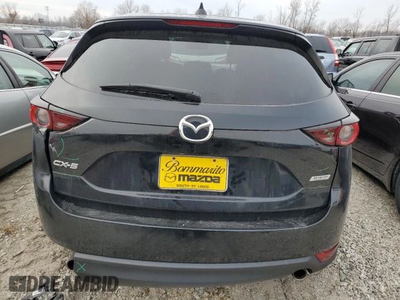 2018 Mazda CX-5 Touring z VIN JM3KFACM9J0300642, wystawiony jako Copart lot #80210854 z przebiegiem 118 309 mil mil oraz Szkoda całkowita • Salvage title. Historia ofert i sprzedaży dostępna na DreamBid. Obrazek 6.