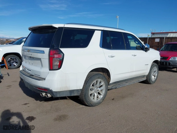 2023 Chevrolet Tahoe Premier with VIN 1GNSKSKDXPR294972, listed as a IAAI auction lot 41648292 with 50,561 mi miles. Bid and sale history available at carsss.com. Image 4.