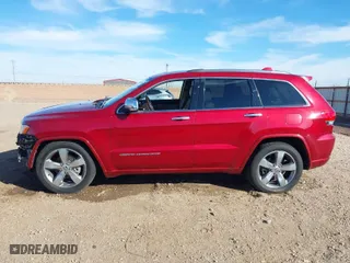 2014 Jeep Grand Cherokee Overland with VIN 1C4RJFCGXEC280970, listed as a IAAI auction lot 41504380 with 115,534 mi miles. Bid and sale history available at carsss.com. Image 14.