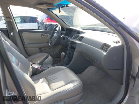 1997 Toyota Camry LE z VIN 4T1BF22K1VU025776, wystawiony jako IAAI lot #42270137 z przebiegiem 168 299 mil mil oraz . Historia ofert i sprzedaży dostępna na DreamBid. Obrazek 5.