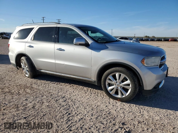 2013 Dodge Durango Crew with VIN 1C4SDHDT0DC590172, listed as a Copart auction lot 80140034 with 135,078 mi miles and Salvage title. Bid and sale history available at DreamBid. Image 4.